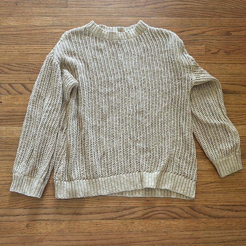 Spell open knit sweater